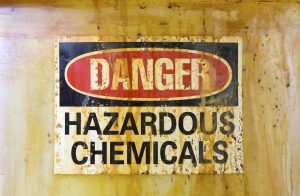 Danger Hazardous Chemicals Sign on a stained storage barrelA related image from my portfolio: